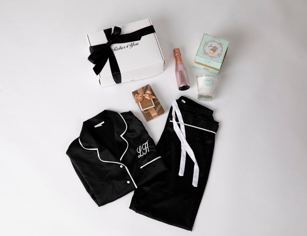 Personalised Black Satin Pjs with Black Piping with Chocolates and Candle & Snippet of Champagnepresented in a gift box with bow