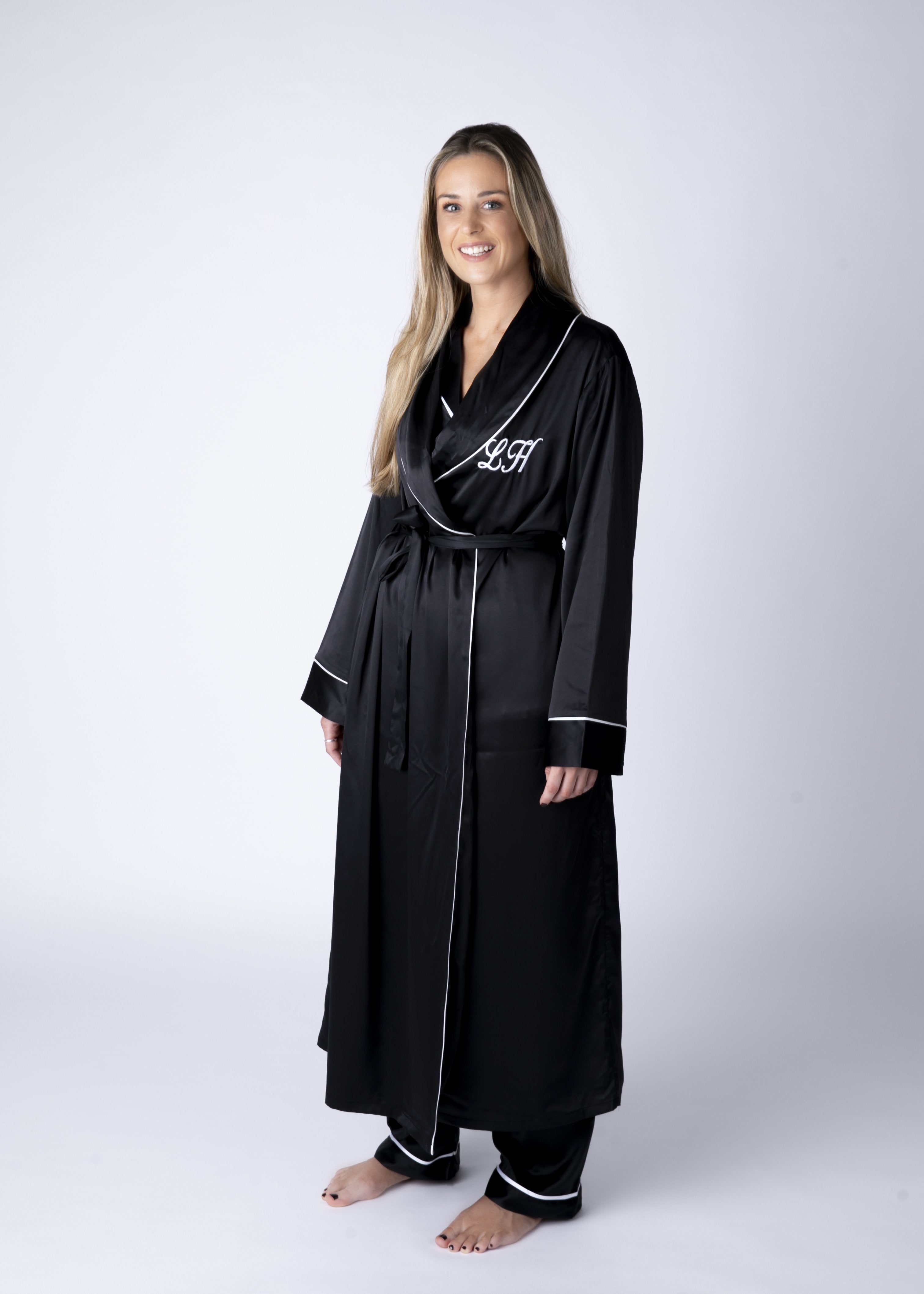 Long Luxurious Silky feel full lenght black satin robe with piping with Matching Pyjamas with chocolates, champagne, candle all presented in a gift box